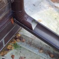 Covering a Gutter Downspout: An Expert's Guide