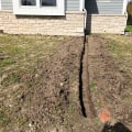 What is the problem with underground downspouts?