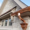 How much does it cost to replace gutters around a house?