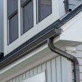 How far should gutters extend past the house?