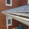 Should gutters go under drip edge?