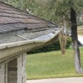 How much should a gutter drop per foot?