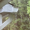 Is it normal for gutters to drip in heavy rain?