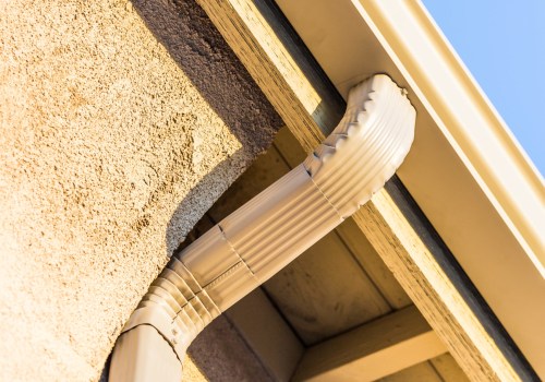 How far should gutters drain from a house?