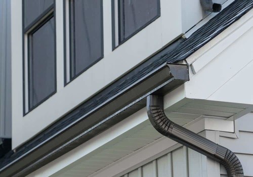 How far should gutters extend past the house?