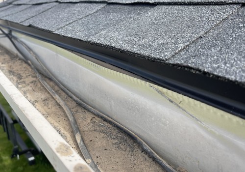 Should gutters be flush with the roof?